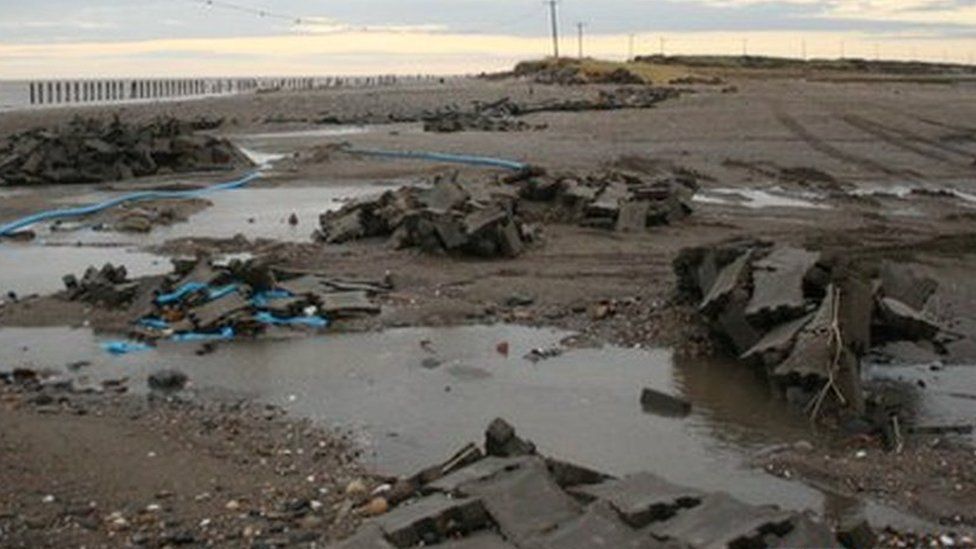 The road along Spurn Point after the North Sea tidal surge