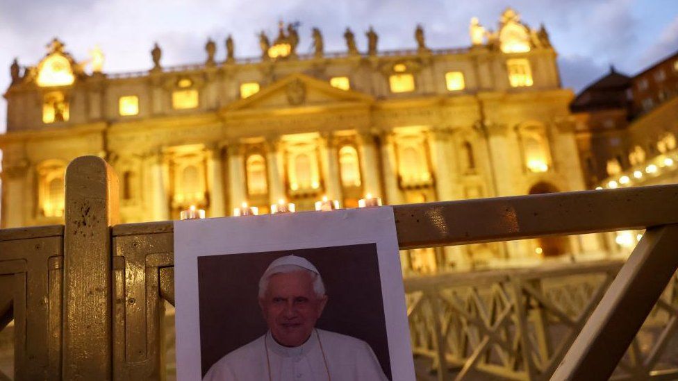 An image of former Pope Benedict in front of St Peter's Basilica