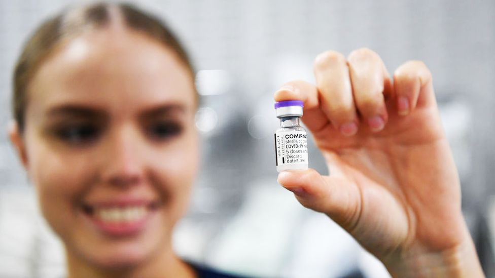 Registered Nurse (RN) Christina O'Donnell holds a vial of the Pfizer COVID-19 vaccine at Townsville University Hospital on 5 March in Townsville, Australia.