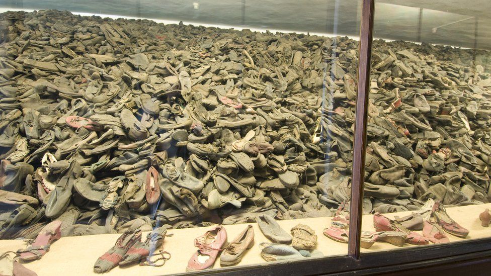 Glass case full of shoes in Auschwitz I