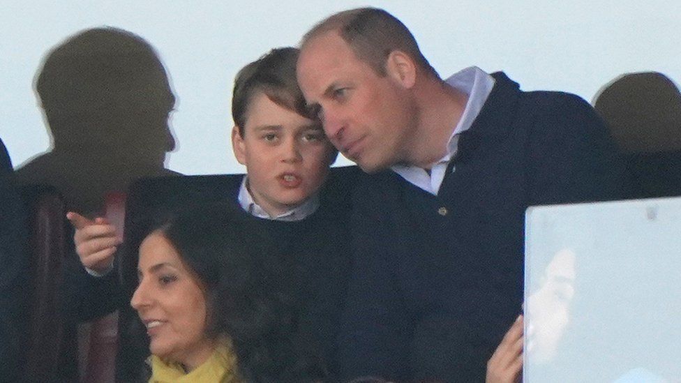 The Prince of Wales with Prince George of Wales before the match