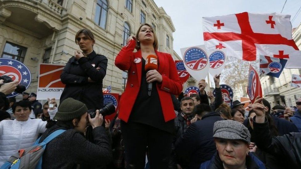 Journalists do a live broadcast at a protest rally outside Georgia's Supreme Court in Tbilisi. Photo: 2 March 2017