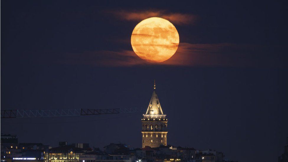 Super moon rises over Grand Camlica Mosque in Istanbul, Turkey