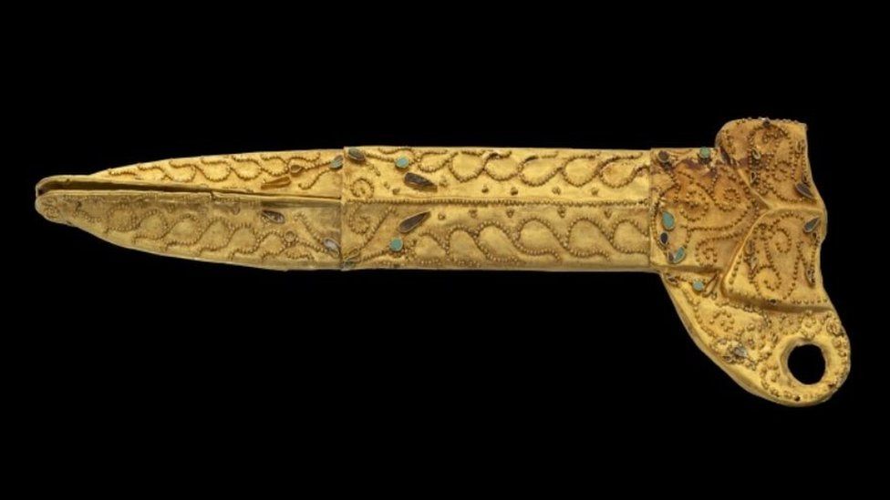 Golden dagger sheath