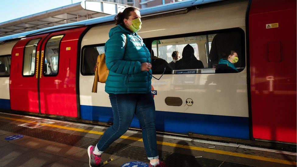 Woman on a London Underground platform
