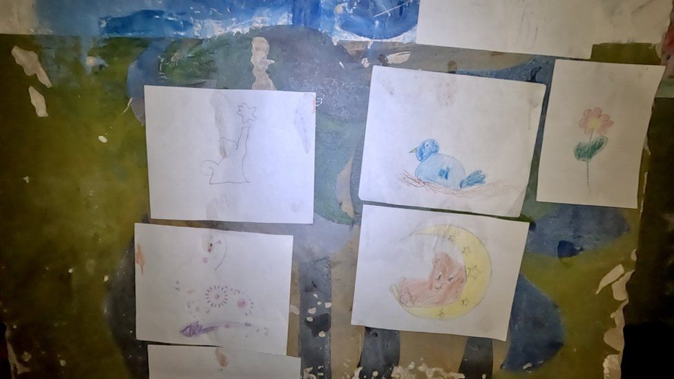 Drawings on the wall of the basement