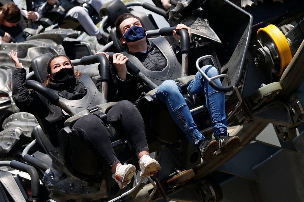 Members of the public on the Swarm rollercoaster ride at Thorpe Park theme park