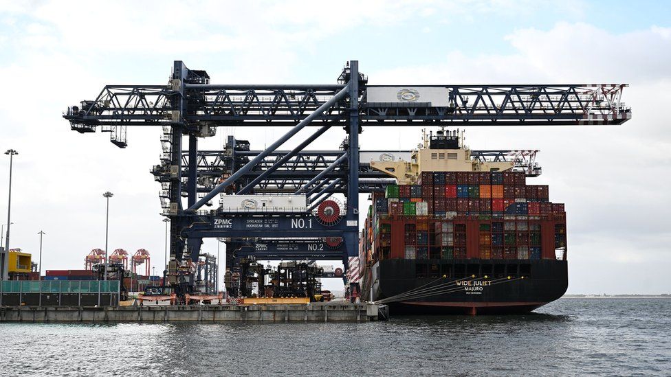 A container ship at Port Botany, which is operated by DP World, is unloaded in Sydney.