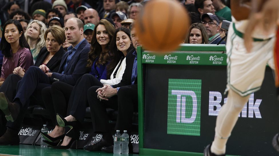 The Prince and Princess of Wales watching an NBA basketball game between the Boston Celtics and Miami Heat during a visit to Boston on 30 November
