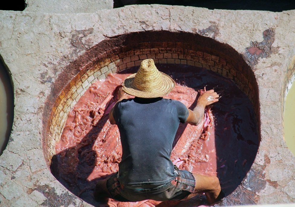 A man works at the Chouara Tannery in Fez.