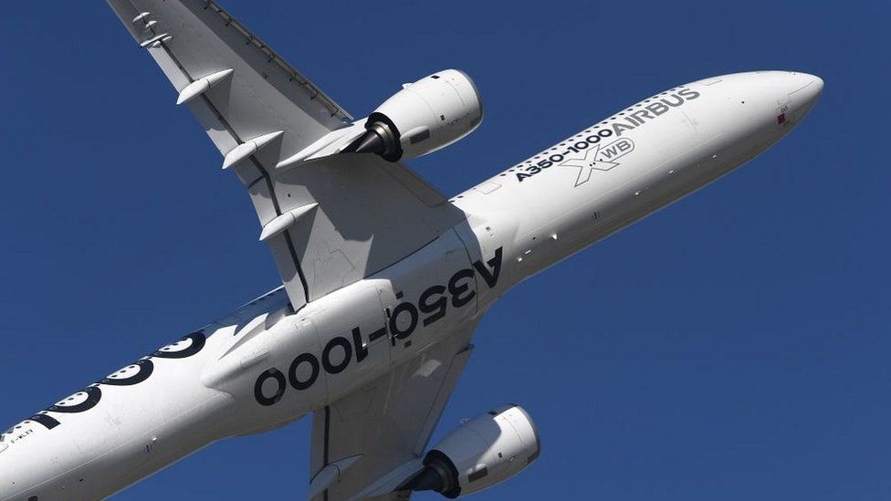 An Airbus A350-1000 performs a flight display at Le Bourget airport on June 19, 2017