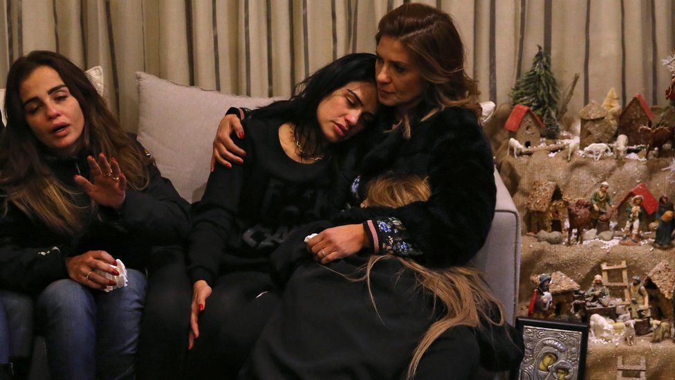 Sisters of Elias Wardini, Lebanese man killed in Istanbul attack, mourn at their house in Beirut on 1 January 2017