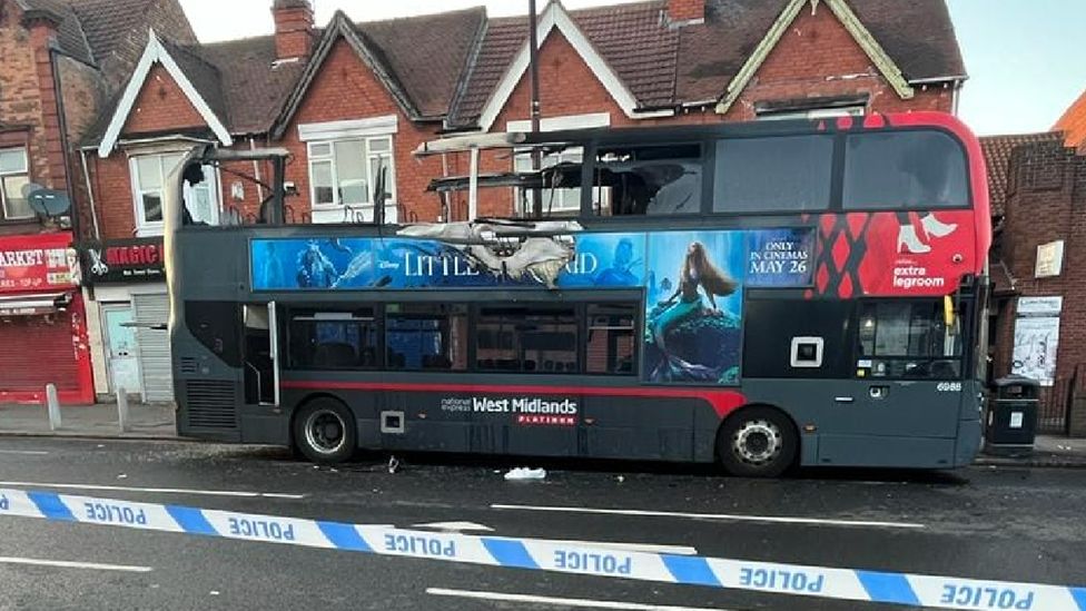 Top deck of Birmingham bus destroyed in suspected arson attack - BBC News