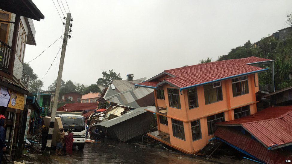 Apartments are destroyed following a landslide due to heavy rain in Harkhar, Chin State of Myanmar on 30 July
