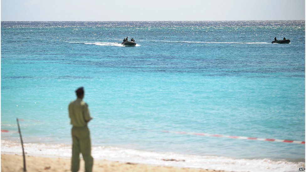 A navy search party, comprising US, French, Yemeni and Comorean navy divers, approaches Galawa beach on July 3, 2009 to restock on fuel as it looks for debris of the Yemenia airline A310 Airbus that crashed on 30 June on a second approach to land at Moroni airport, killing all but one of the 153 passengers on board.