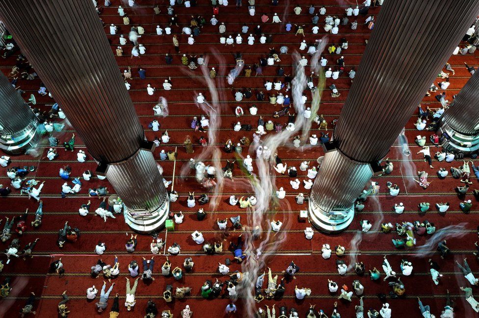 Indonesian Muslims shown shortly after Friday prayers in the month of Ramadan at Istiqlal mosque in Jakarta, Indonesia