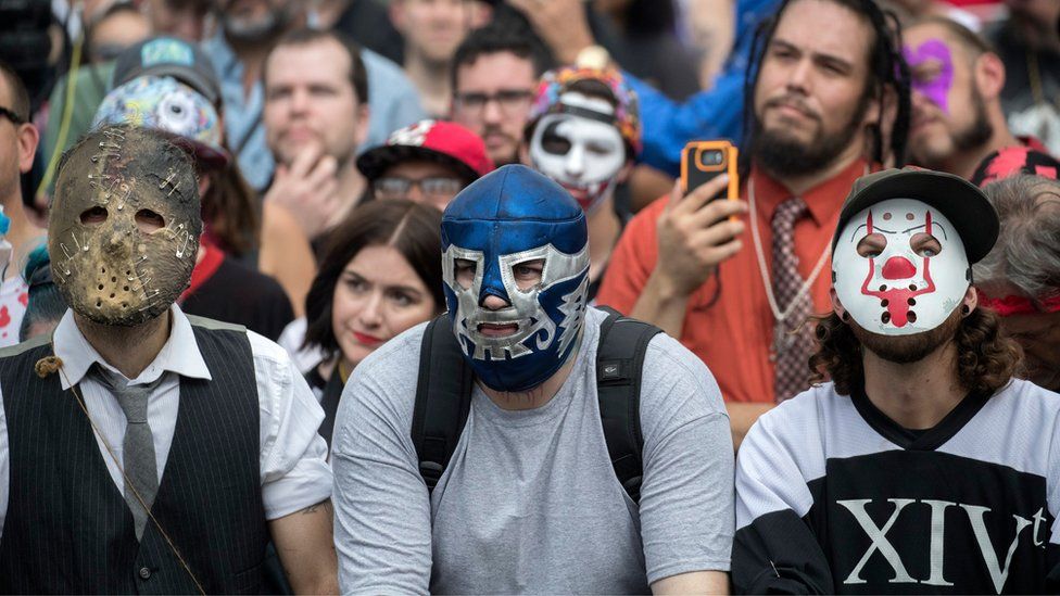 Juggalos, fans of the band Insane Clown Posse, listen to a speaker during the Juggalo March at the Lincoln Memorial in Washington, DC, USA, 16 September 2017