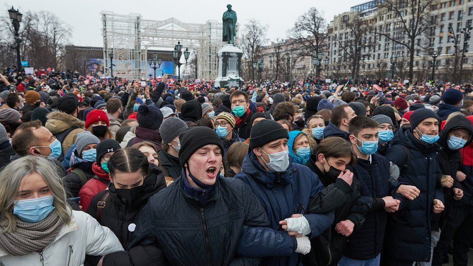 People attend a rally in support of jailed opposition leader Alexei Navalny in Moscow