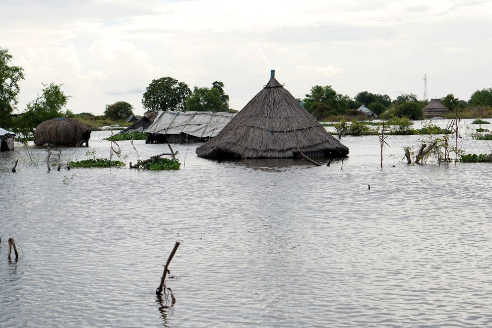 A structure is seen covered by water after heavy rains and floods forced hundreds of thousands of people to leave their homes, in the town of Pibor, Boma state