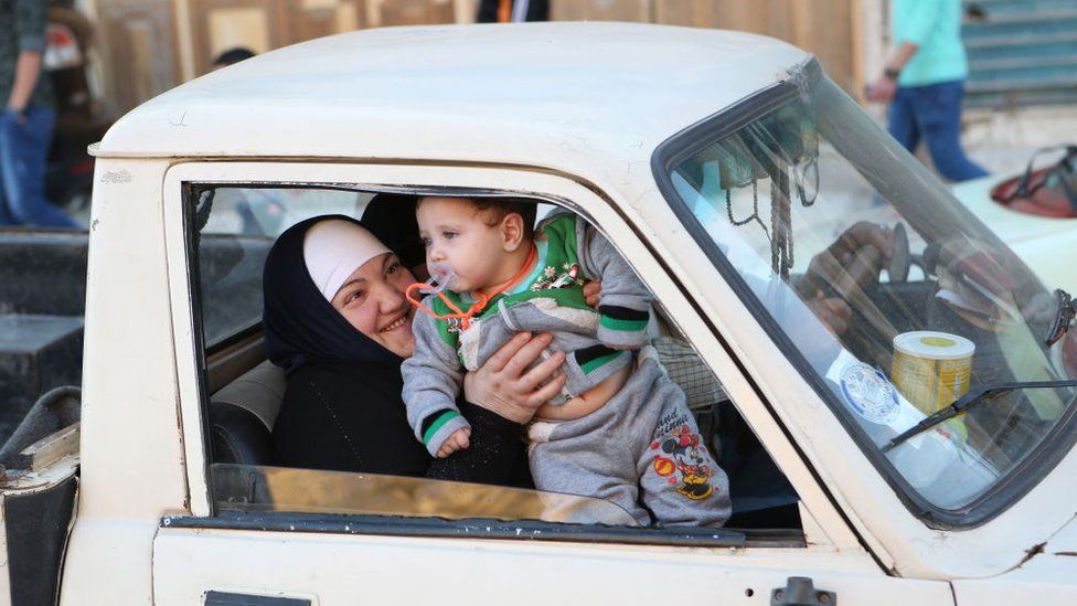 Syrian woman with child, file pic