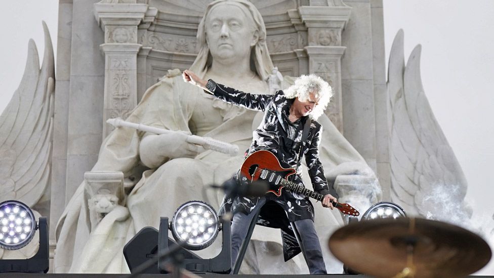 Queen guitarist Brian May performed under the gaze of Queen Victoria on the Victoria Memorial