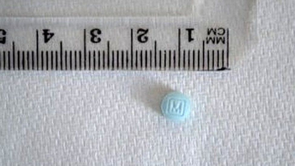 small blue counterfeit oxycodone tablets