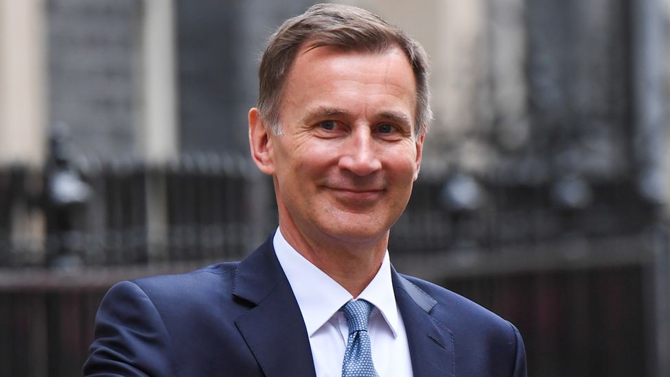 Jeremy Hunt, UK chancellor of the exchequer, holding the despatch box outside 11 Downing Street in London, UK, on Wednesday, March 15, 2023