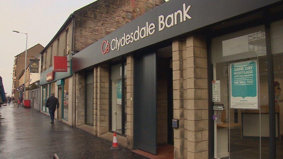 Security guard targeted in armed robbery outside bank BBC News