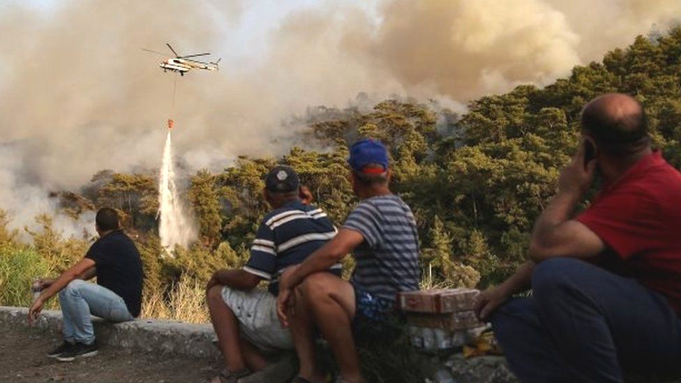 A helicopter is deployed against a fire near Marmaris