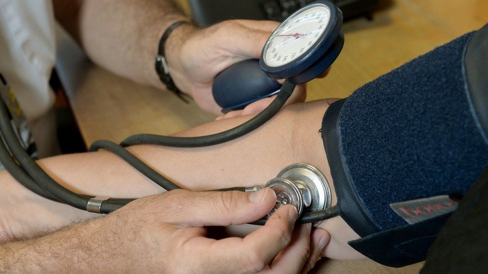 Blood pressure test with a patient