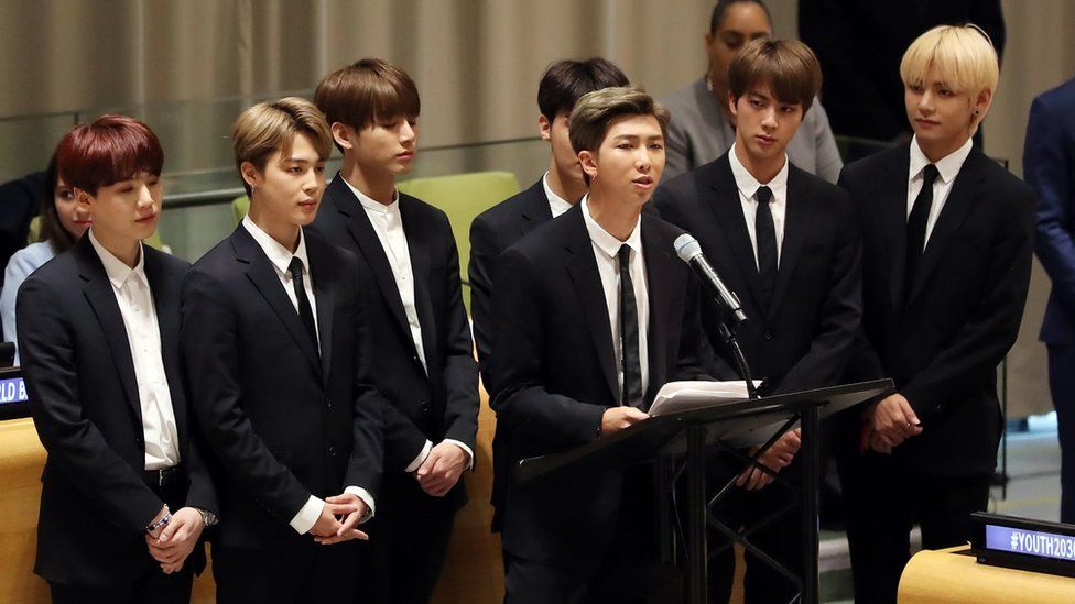 RM (at the podium), leader of South Korean boy band BTS, speaks during an event at the U.N. headquarters in New York