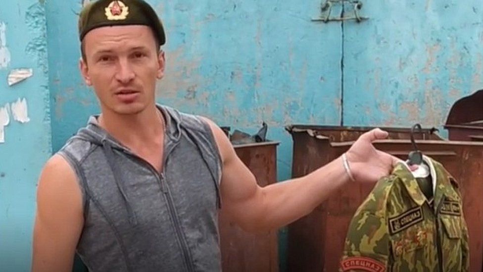 Belarusian ex-Spetsnaz soldier dumping his uniform - screenshot