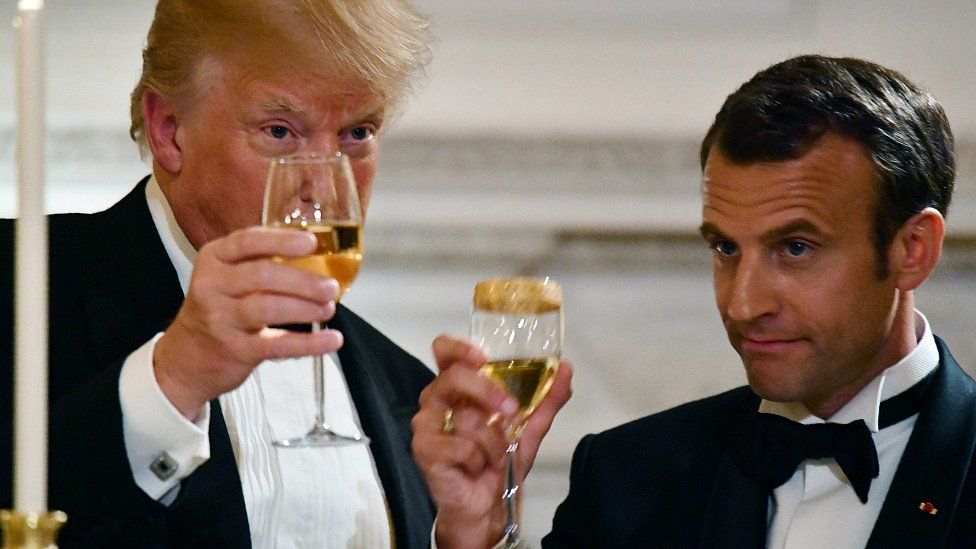 US President Donald Trump and French President Emmanuel Macron toast during a State Dinner at the White House, April 24, 2018