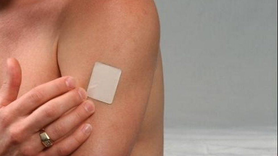 A man uses a nicotine patch. File photo