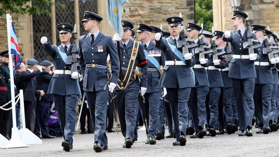 RAF cadets chip in to bring lost Ely hospital sign back - BBC News