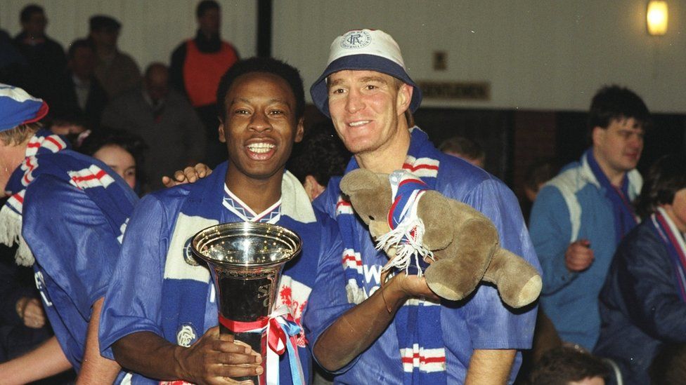 Mark Walters (left) and Richard Gough (right) of Rangers celebrate with the trophy after their victory in the Skol Cup Final against Celtic at Hampden Park in Glasgow, Scotland. Rangers won the match 2-1
