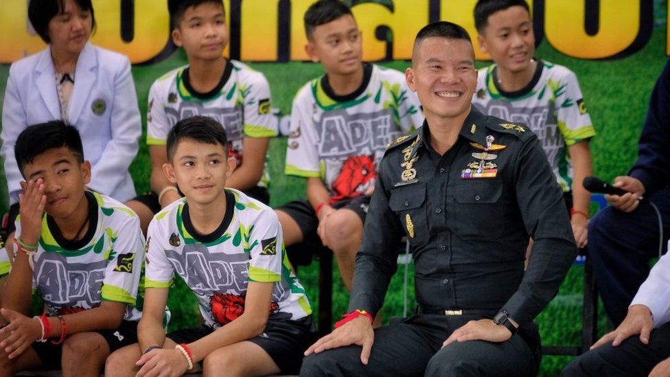 CHIANG RAI, THAILAND - JULY 18: Twelve boys from the "Wild Boars" soccer team and a Thai Navy SEAL (Right) speak during a press conference for the first time since they were rescued from a cave in northern Thailand last week, on July 18, 2018 in Chiang Rai, Thailand. The 12 boys, aged 11 to 16, and their 25-year-old coach were discharged early from Chiang Rai Prachanukroh hospital after a speedy recovery and thanked those involved in their rescue. (Photo by Linh Pham/Getty Images)