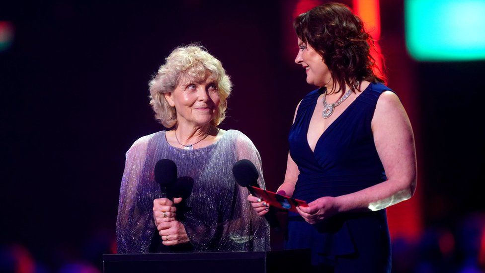 Jo Hamilton and Monica Dolan on stage to present the award for Song of the Year during the Brit Awards 2024 at the O2 Arena