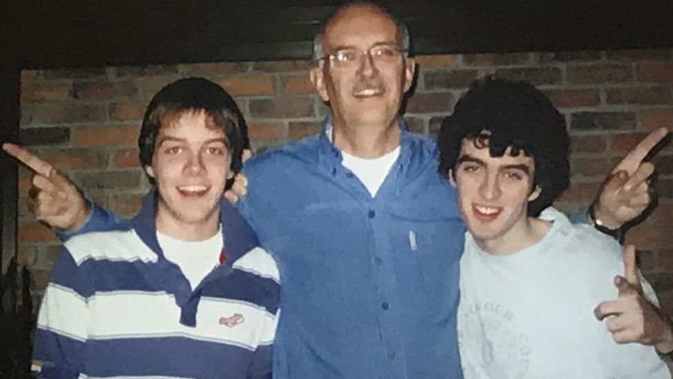 Richard Lowry (centre) with his sons