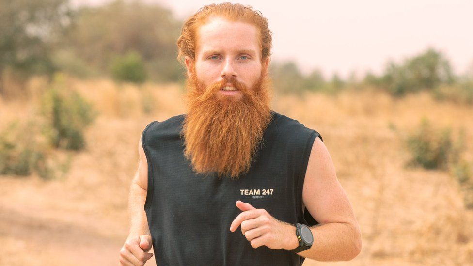 Russell Cook running in Africa