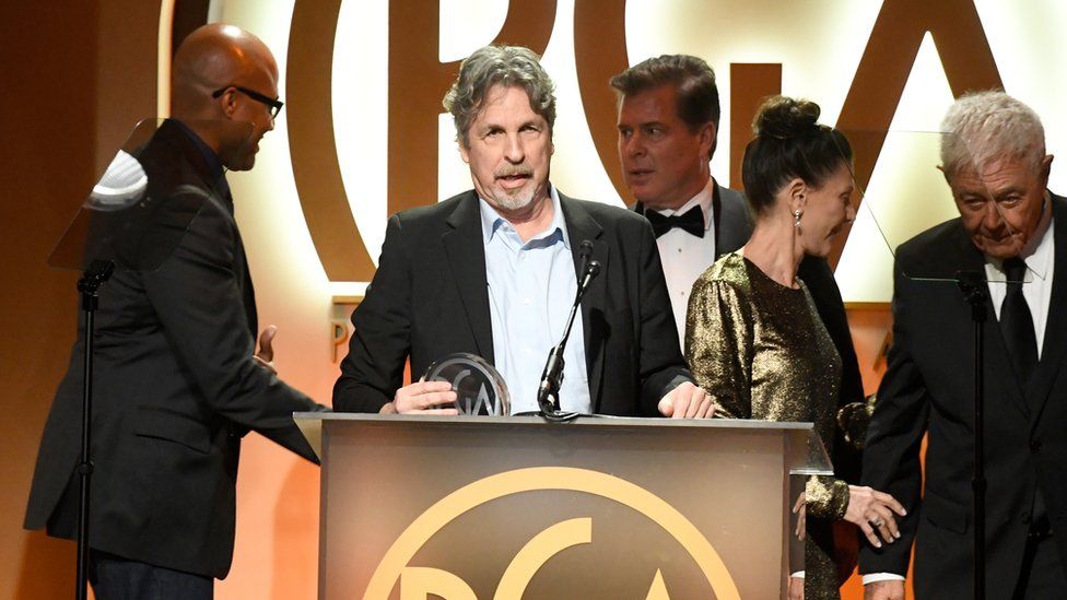 Green Book director and producer Peter Farrelly (second left) accepted the Producers' Guild of America Award