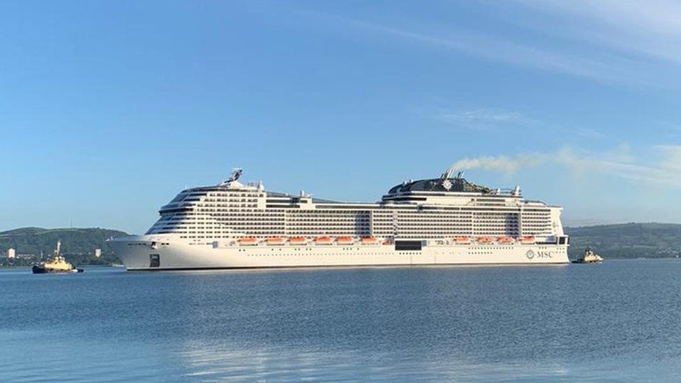 The MSC Virtuosa pictured from the shore in Belfast on a clear day, this image showing the vessel further out from shore, with some of its front visible
