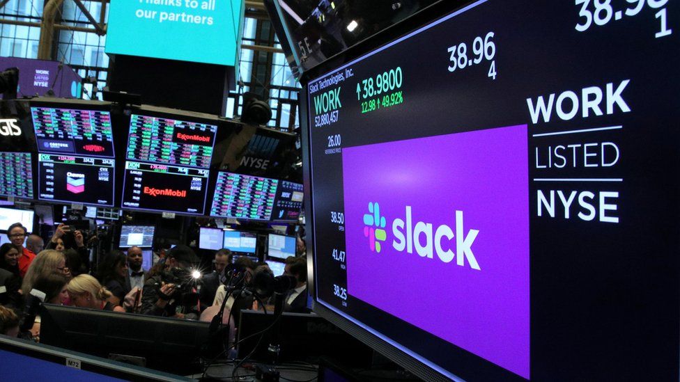 The stock price of Slack Technologies Inc. trading under the symbol (WORK) is seen on a display above the floor of the New York Stock Exchange (NYSE) during the company"s direct listing in New York, U.S. June 20, 2019