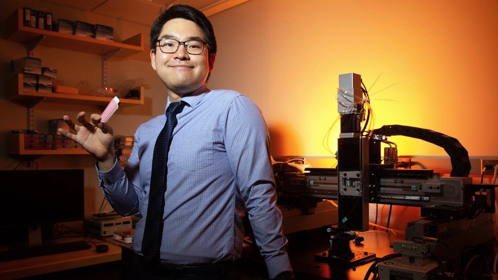 Hyunwoo Yuk, from MIT, holds the double-sided tissue adhesive