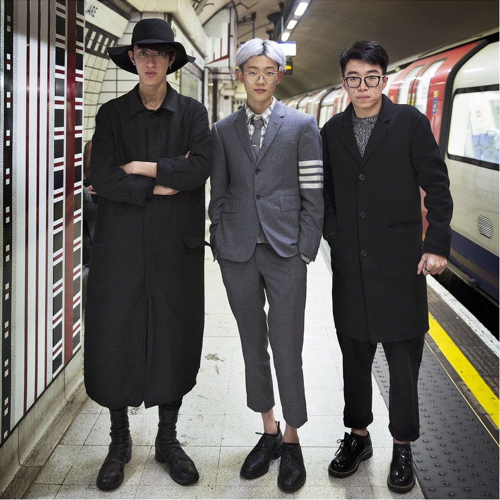 Three people posing on the underground system