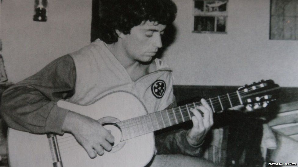 Undated picture of Alejandro Puccio playing the guitar
