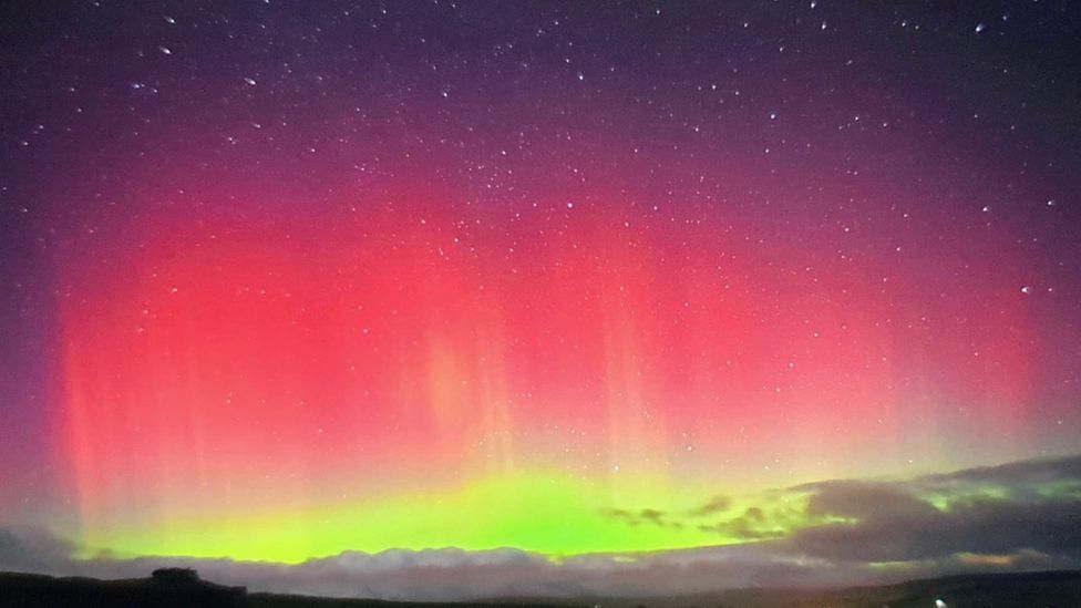 Green and red lights created by the aurora borealis