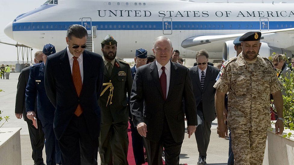 US Defence Secretary Robert Gates walks with US Ambassador to the UAE Richard Olson and Emirati Deputy Chief of Staff, Major General Ali al-Kaabi, upon his arrival at the Al-Dhafra Air Base in Abu Dhabi on March 11, 2010