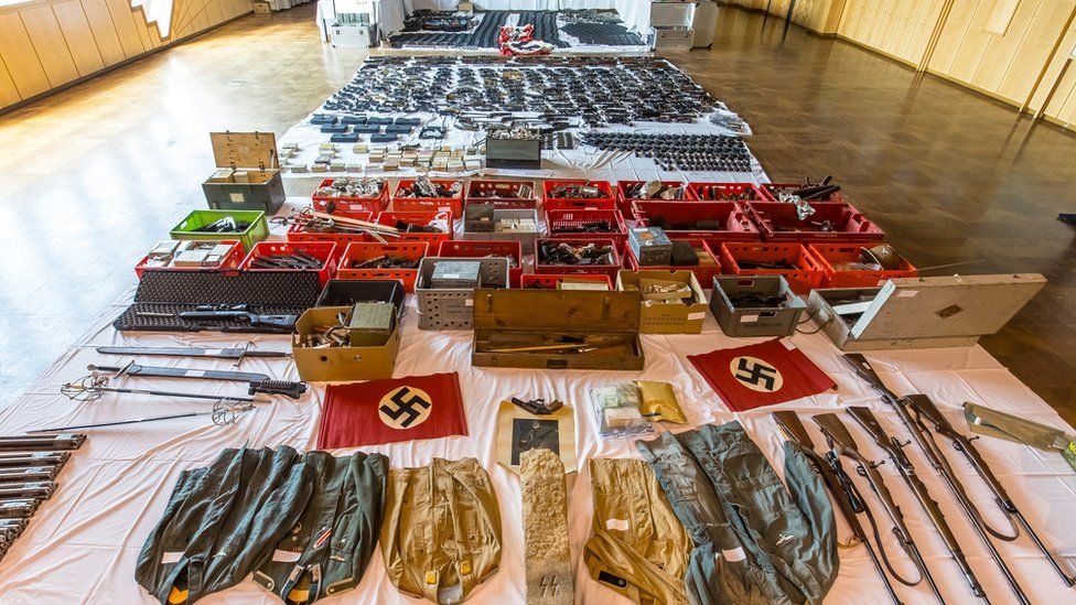 A display of hundreds of weapons seized during raids in Austria