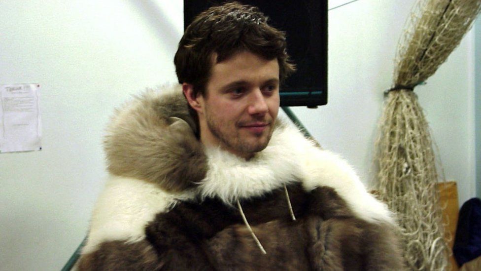 Crown Prince Frederik wears a fox skin jacket, a gift from the people of Quaanaq, northern Greenland, in 2000